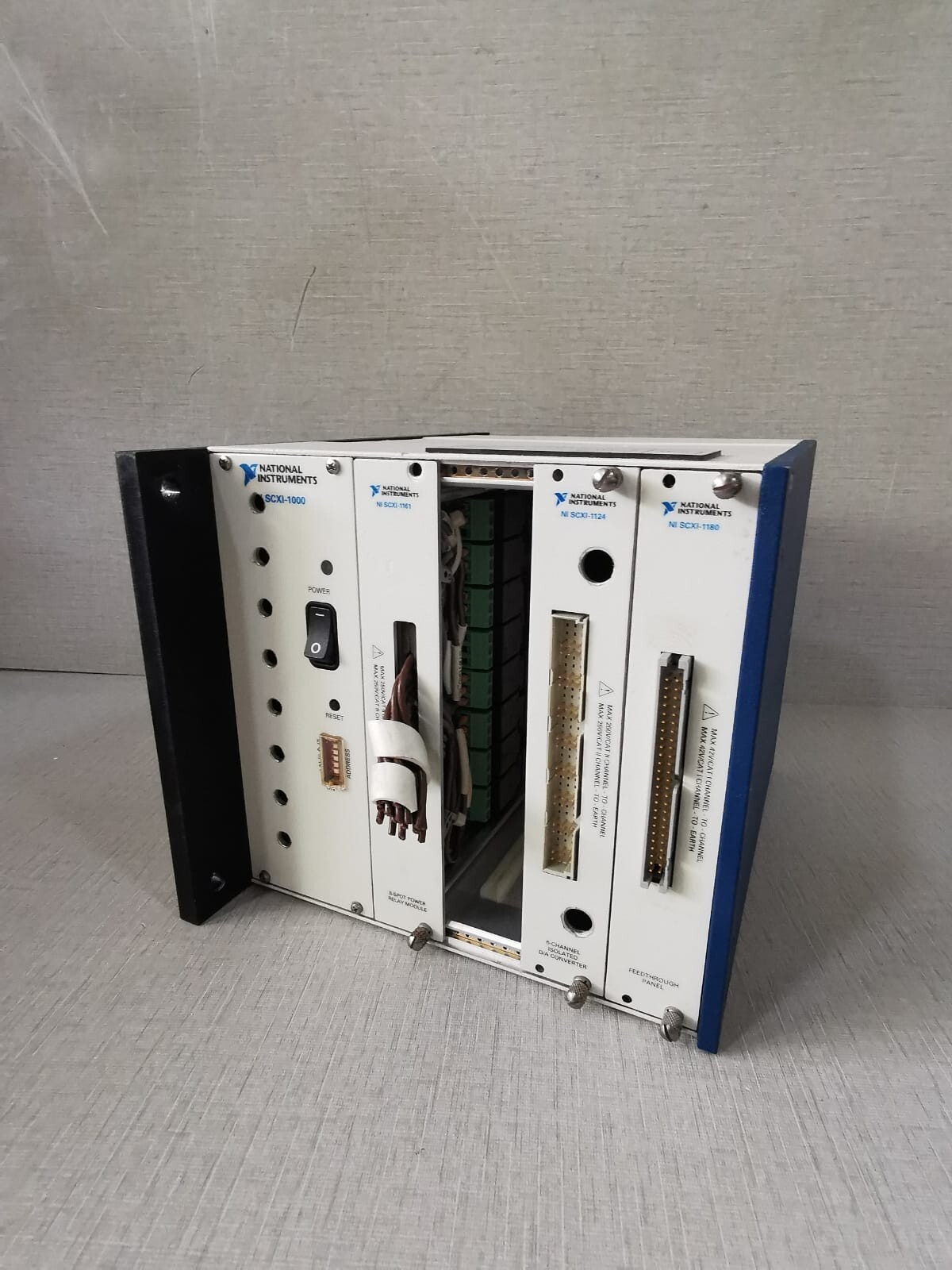 National Instruments 181445M-01 NATIONAL INSTRUMENTS SCXI-1000 SCXI-1161 SCXI-1124 SCXI-1180 PLC MODULE 4
