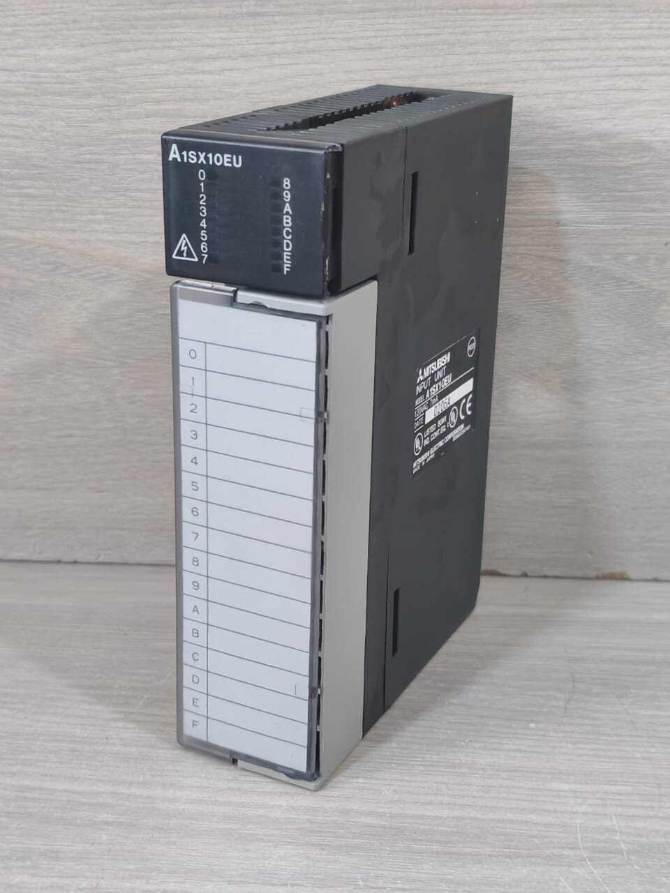 Mitsubishi Electric A1SX10EU MITSUBISHI A1SX10EU INPUT UNIT 120VAC 7mA- WITH BROKEN TOP COVER 3